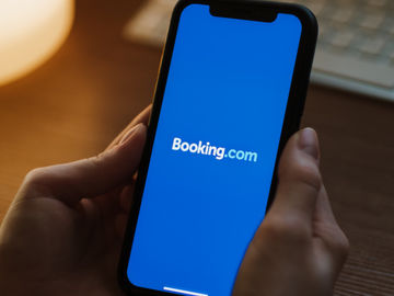 Booking’s Fogel sees signs of “record summer travel season”